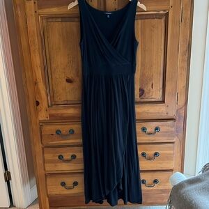 Soft black, flattering sleeveless V-neck dress.